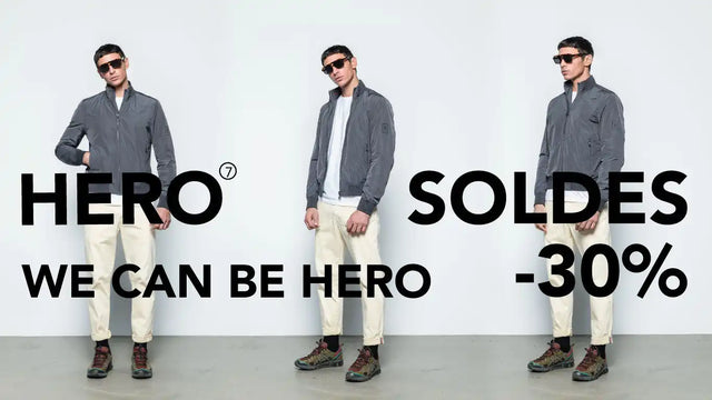 Publicité de mode montrant trois poses d'un modèle portant une veste grise, un pantalon beige et des bottes marron avec un texte superposé « HÉRO SOLDES -30% ».